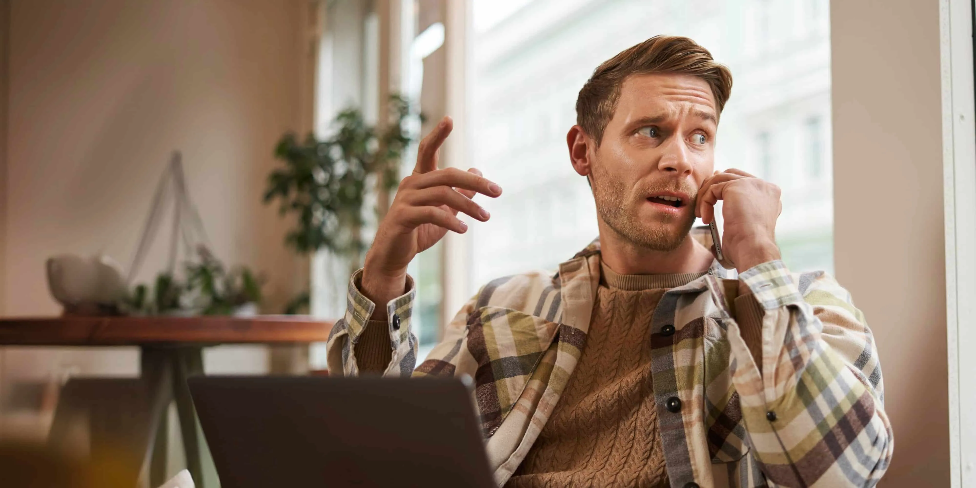 Business professional on a phone call in a modern office setting